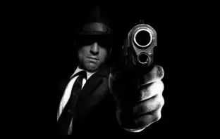 Mobster pointing a gun